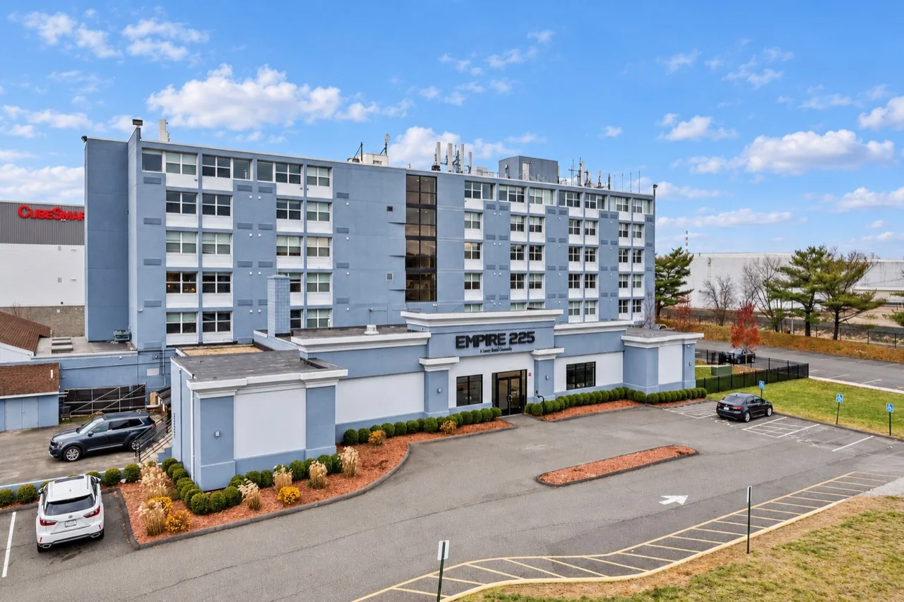 Daylight view of the Empire 225 building and entrance