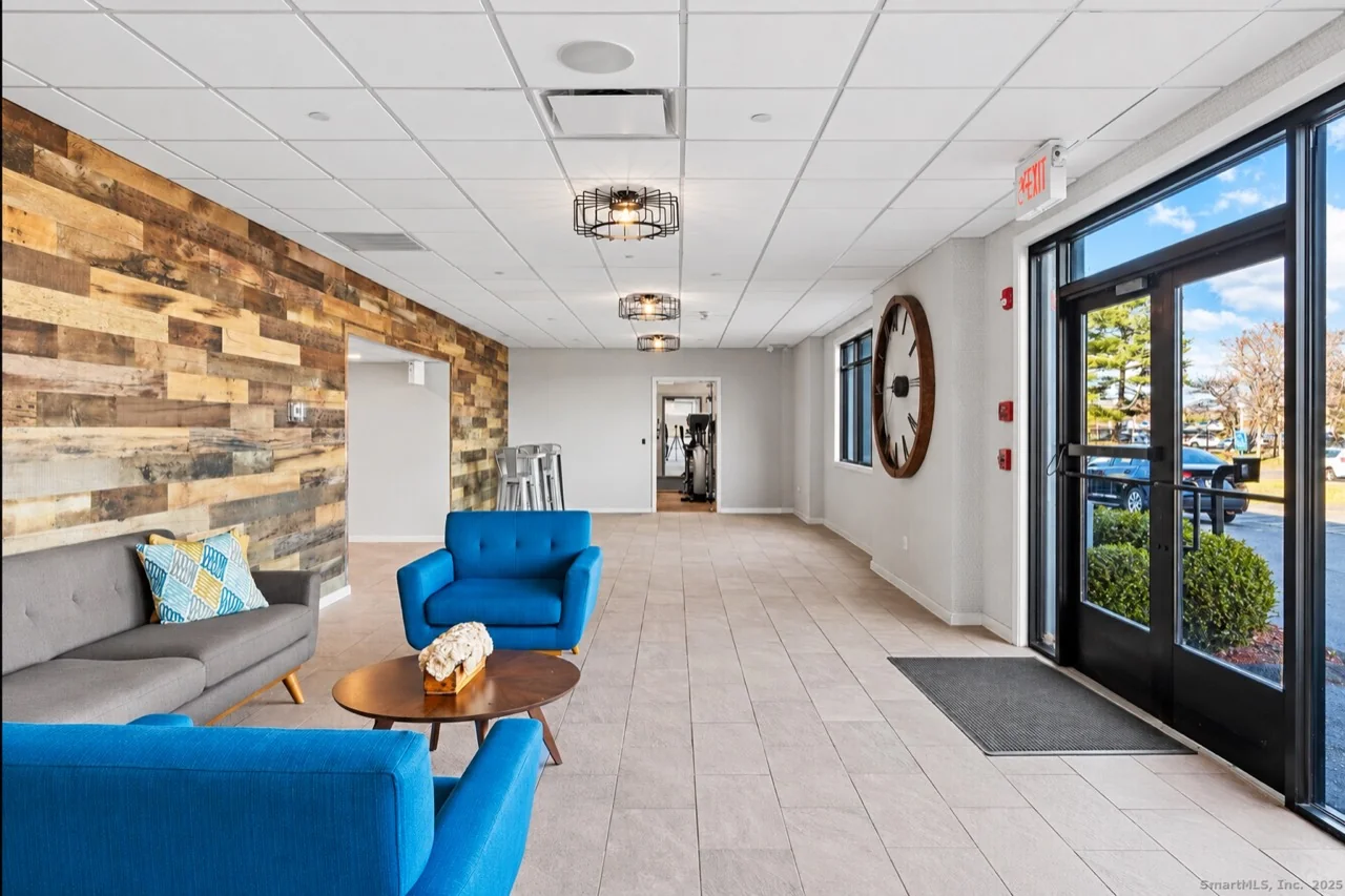 Empire 225 lobby seating and glass entrance doors